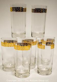 Set of Seven (7) Vintage Clear Glass Tumblers with Gold Trim. 