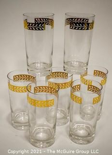 Set of Seven (7) Vintage Clear Glass Tumblers with Gold Trim. 