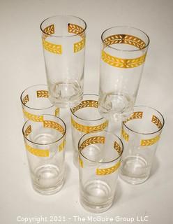 Set of Seven (7) Vintage Clear Glass Tumblers with Gold Trim. 