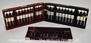 Three (3) Antique Calculators or Abacus