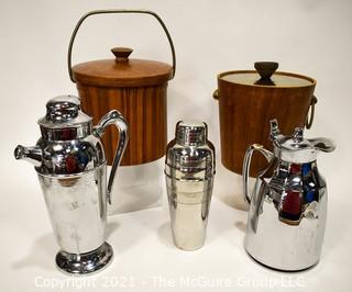 Collection of Vintage Mid Century Modern Barware.  Includes Two (2) Ice Buckets, Two (2) Chrome Cocktail Shakers and One (1) Chrome Insulated Carafe. 