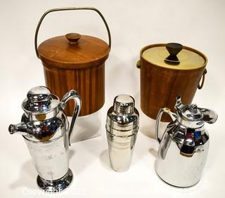 Collection of Vintage Mid Century Modern Barware.  Includes Two (2) Ice Buckets, Two (2) Chrome Cocktail Shakers and One (1) Chrome Insulated Carafe. 