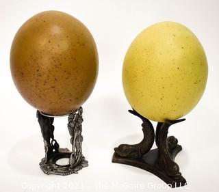 TWo (2) Faux Decorative Ostrich Eggs on Stands. 