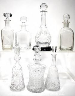 Seven (7) Clear Glass & Crystal Bar Liquor Decanters with Stoppers