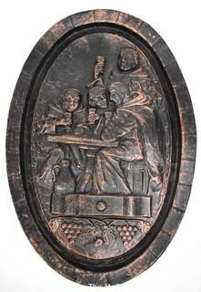 Heavy Cast Iron Oval Plaque of Monks in the Wine Cellar. 18" x 12".