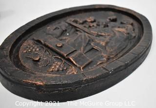 Heavy Cast Iron Oval Plaque of Monks in the Wine Cellar. 18" x 12".