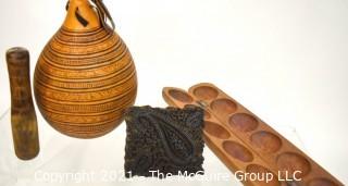 Four (4) Carved Wooden Items Including Batik Press, Mancala Games, Gourd and Mallet