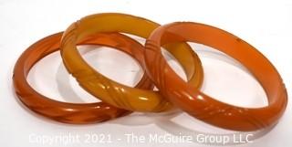 Set of Three (3) Carved Bakelite Bangle Bracelets in Butterscotch