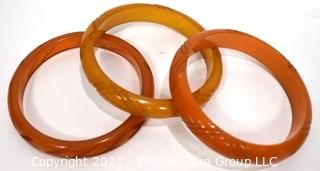 Set of Three (3) Carved Bakelite Bangle Bracelets in Butterscotch