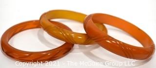 Set of Three (3) Carved Bakelite Bangle Bracelets in Butterscotch