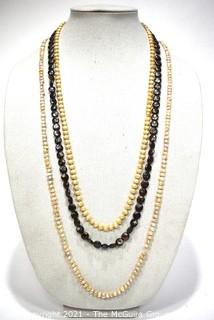 Three (3) Opera Length Fresh Water Pearl Necklaces Including One with Grey Coin Pearls.