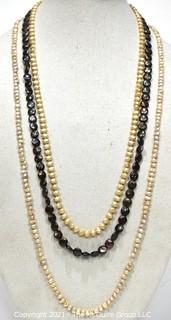 Three (3) Opera Length Fresh Water Pearl Necklaces Including One with Grey Coin Pearls.