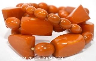 Mid Century Bakelite Art Deco Butterscotch Amber Bead Necklace in Geometric Shapes.  Measures 24" long.