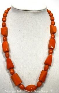 Mid Century Bakelite Art Deco Butterscotch Amber Bead Necklace in Geometric Shapes.  Measures 24" long.