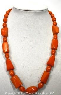 Mid Century Bakelite Art Deco Butterscotch Amber Bead Necklace in Geometric Shapes.  Measures 24" long.