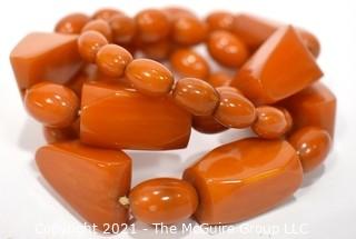 Mid Century Bakelite Art Deco Butterscotch Amber Bead Necklace in Geometric Shapes.  Measures 24" long.