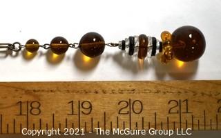 Vintage Art Deco Hand Blown Amber & Black Glass Drop Bead Necklace on Metal Chain with Pendant Center.  