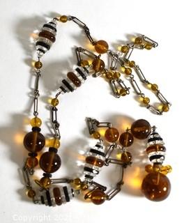 Vintage Art Deco Hand Blown Amber & Black Glass Drop Bead Necklace on Metal Chain with Pendant Center.  