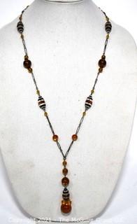 Vintage Art Deco Hand Blown Amber & Black Glass Drop Bead Necklace on Metal Chain with Pendant Center.  