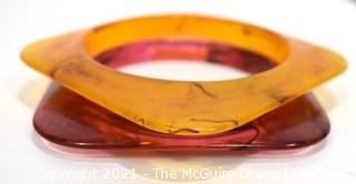 Pair of Vintage Bakelite Square Bangle Bracelets in Butterscotch Apple Juice and Pink .