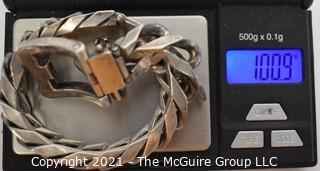 Vintage Sterling Chain Buckle Bracelet with Chunky Curb Links Adjustible Closure and Fold Over Safety Clasp.     Weighs 100.9 g.