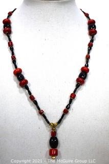 Vintage Red & Black Glass Drop Bead Necklace with Pendant Center.