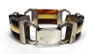 Vintage Root Beer and White Bakelite with Sterling Silver Link Bracelet. Weighs 54g