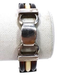 Vintage Root Beer and White Bakelite with Sterling Silver Link Bracelet. Weighs 54g