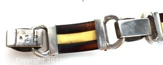 Vintage Root Beer and White Bakelite with Sterling Silver Link Bracelet. Weighs 54g