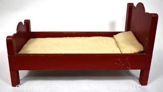 Antique Primitive Hand Made Red Painted Doll Bed.  Measures 24" x 14" x 13".