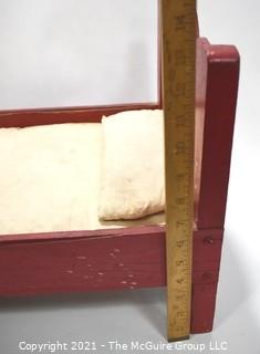 Antique Primitive Hand Made Red Painted Doll Bed.  Measures 24" x 14" x 13".