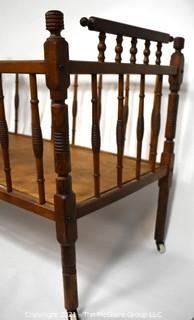 Antique Mahoghany Spindle Baby Bed.  Measures 36" x 19" x 25"