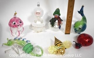  Collection of Seven (7) Free Blown Glass Christmas Tree Ornaments Including Ocotopus, Angel, Snowman, Whale, Sea Creature, Bumble Bee & Lady Bug. 