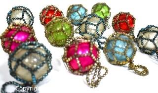 Twelve (12) Vintage Bead Netted Glass Ball Ornaments in Original Box. 