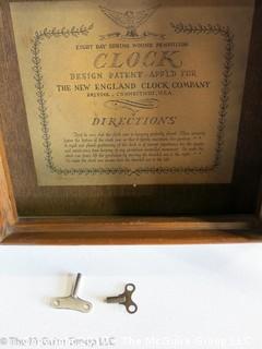 8 Day Mechanical Clock; the New England Clock Co., Brsitol, Ct.; 14 1/2 x 23 x 4" deep 