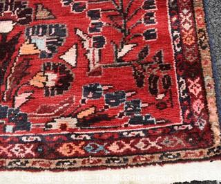 Hand Woven Persian Wool Runner Rug with Botanical Design on Red Ground. Measures 42" x 125"