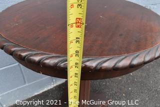 Vintage Round Pedestal Table with Spiral Carved Edge. Measures 24" D x 29" T.