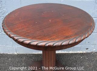 Vintage Round Pedestal Table with Spiral Carved Edge. Measures 24" D x 29" T.