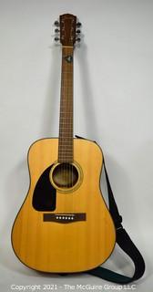 Fender CD100LH Acoustic Guitar in Natural Finish with Padded Soft Case.