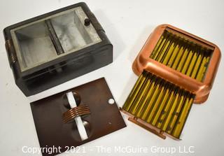 Two Vintage Cigarette Cases, One Made of Copper