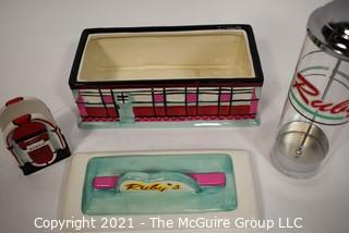 Three Piece Set of Ruby's Roadside Diner Decorative Items Including Cookie Jar, Straw Dispenser and Napkin Holder.   