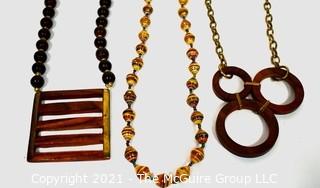 Three (3) Retro Boho Necklaces, Two Made of Wood. 
