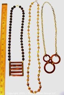 Three (3) Retro Boho Necklaces, Two Made of Wood. 
