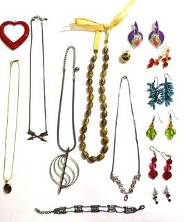 Mixed Group of Costume Jewelry Including Necklaces, Bracelet and Pierced Earrings. 