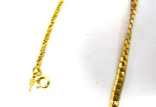 Four Pieces of Gold Tone Costume Jewelry Necklaces. 