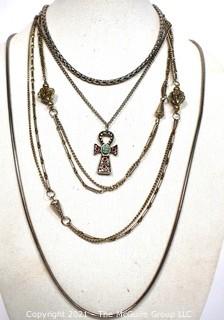 Four Pieces of Silver Tone Costume Jewelry Necklaces.
