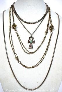 Four Pieces of Silver Tone Costume Jewelry Necklaces.
