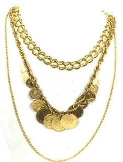 Three Chunky Gold Tone Necklaces Including One With Coins.