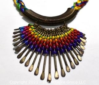 Artisan Made Hammered Brass Fringe on Multi Color Cords Necklace. Measures 21" long. 