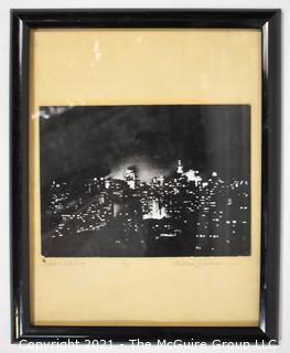 Framed Under Glass Black & White Photograph of New York City Entitled "While a Baby Cries" Signed and Numbered by Artist William Lawrence, 1969. Measures 12" x 15".